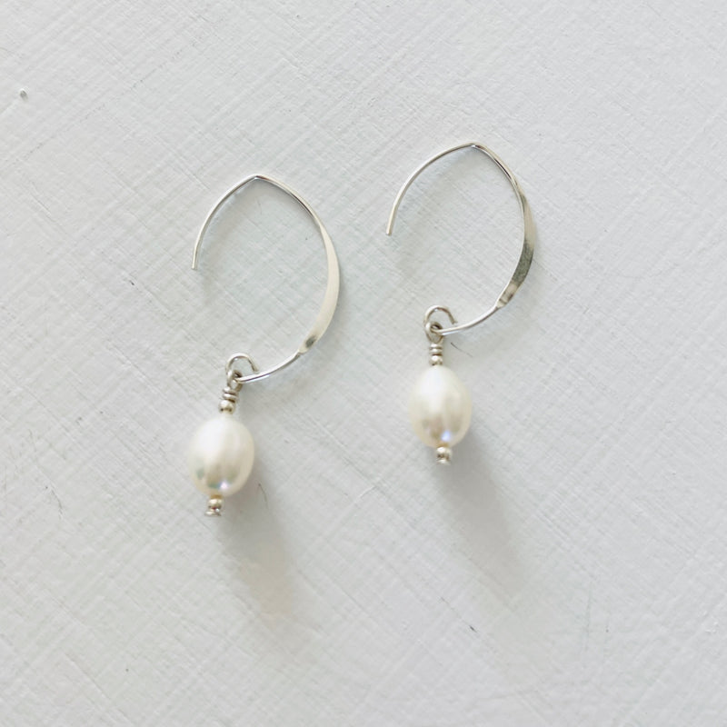 Classy Crescent Pearl  Earrings by ZEN by Karen Moore Jewelry silver on white background