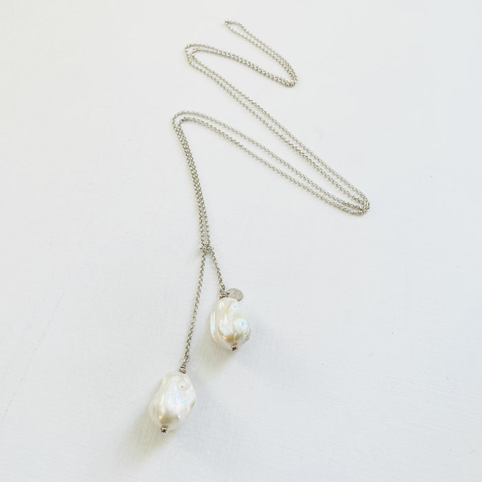 Wisdom Within ZEN Wrap Necklace by ZEN by Karen Moore Jewelry showing chain zig-zagged on a white background