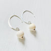 Classy Conch Shell Crescent Earrings by ZEN by Karen Moore in sterling silver on white background