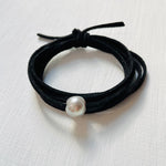 Pearl Of Wisdom Black Eco Zen Wrap Jewelry by ZEN by Karen Moore on white wood