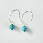 Classy Turquoise Crescent Earrings by ZEN by Karen Moore on white background close up