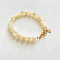 Nurtured by Nature Mother of Pearl Bracelet with 14K gold clasp by ZEN by Karen Moore jewelry zoomed in view on white background