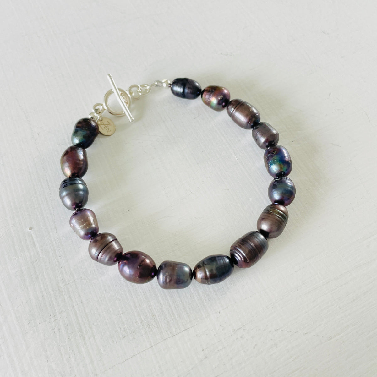 Mermaid Pearl Bracelet with sterling silver by ZEN by Karen Moore jewelry slightly angled view on white background