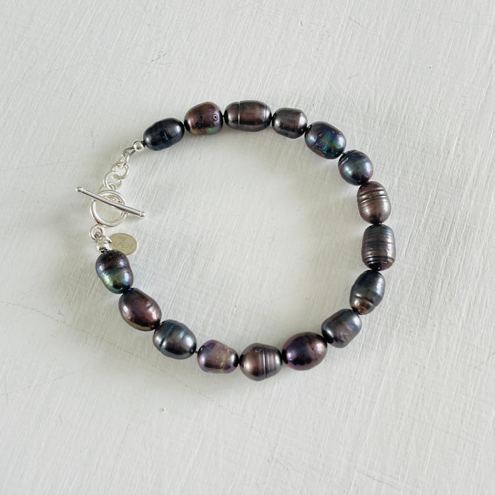 Mermaid Pearl Bracelet with sterling silver by ZEN by Karen Moore jewelry overhead view on white background