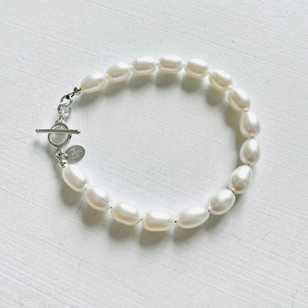 Brilliant White Pearl Bracelet by ZEN by Karen Moore jewelry with sterling silver clasp on white background