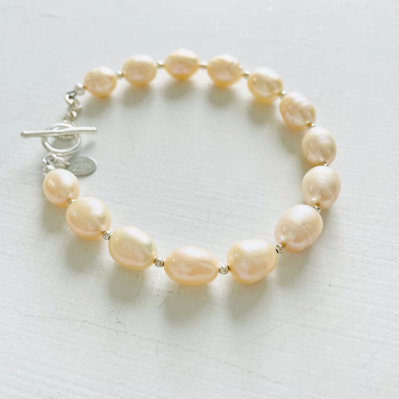 Just Peachy Pearl Bracelet with sterling silver clasp by ZEN by Karen Moore Jewelry close up on white background