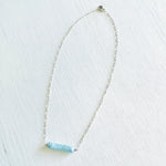 Clear Your Mind Aquamarine Necklace by ZEN by Karen Moore jewelry in sterling silver on white background