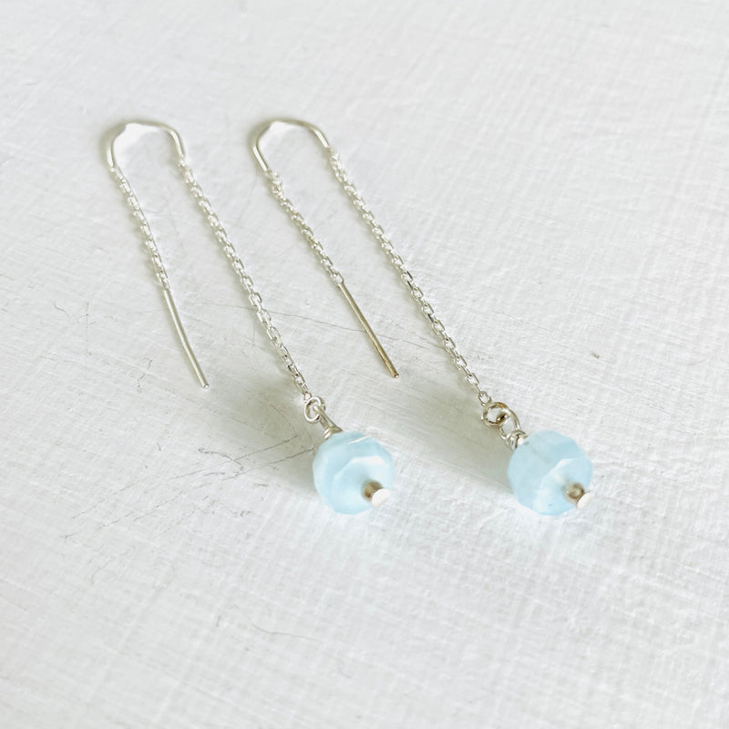Drop into the Calm Aquamarine Earrings by ZEN by Karen Moore jewelry in sterling silver close up view on white background