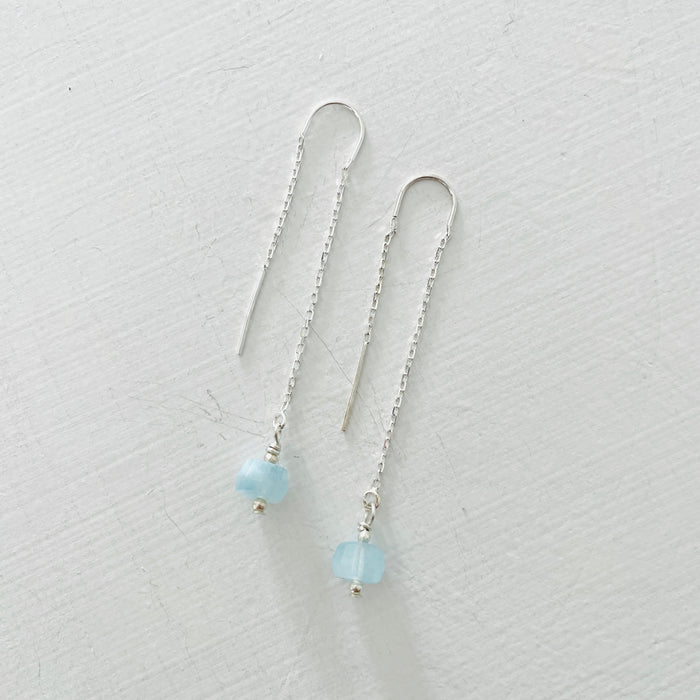 Drop into the Calm Aquamarine Earrings by ZEN by Karen Moore jewelry in sterling silver on white background