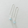 Drop into the Calm Aquamarine Earrings by ZEN by Karen Moore jewelry in sterling silver on white background