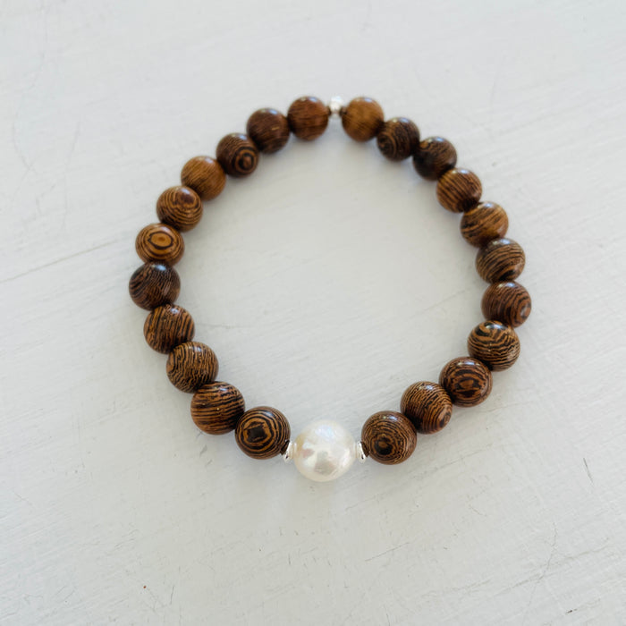 Mojo Freshwater Pearl Tiger Wood Bracelet by ZEN by Karen Moore on white wood background