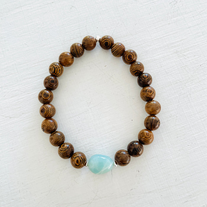 Mojo Amazonite Tiger Wood Bracelet by ZEN by Karen Moore on white wood background