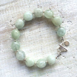 Courage To Be You Aquamarine Bracelet by ZEN by Karen Moore with silver accents overhead view on white background