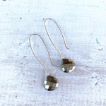 Magnificent Manifestor pyrite earrings in sterling silver by ZEN by Karen Moore white wood