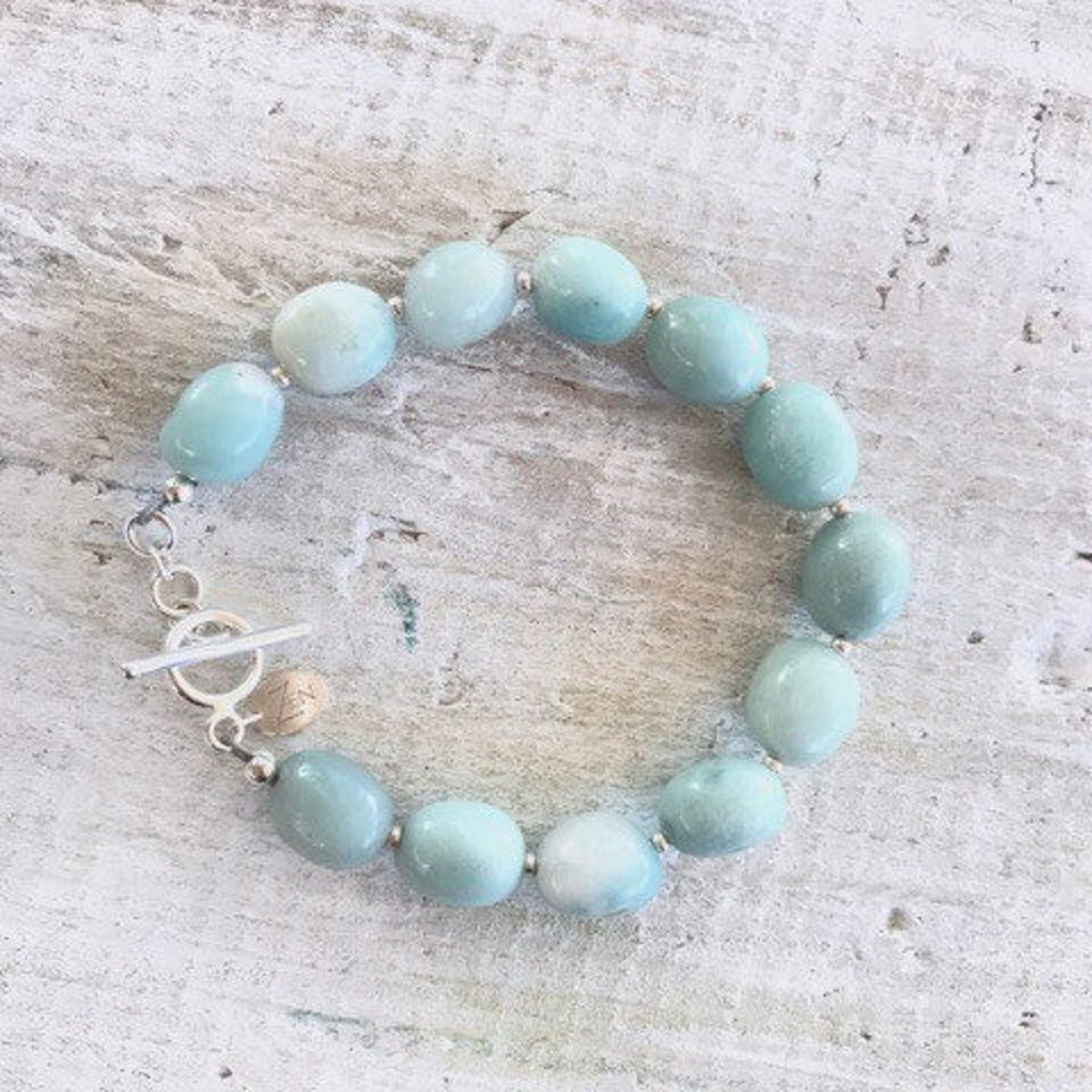 Amazonite Seas The Day Bracelet by ZEN by Karen Moore jewelry on white wood
