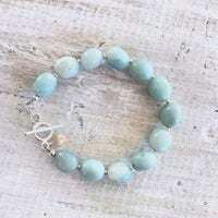 Amazonite Seas The Day Bracelet by ZEN by Karen Moore jewelry on white wood