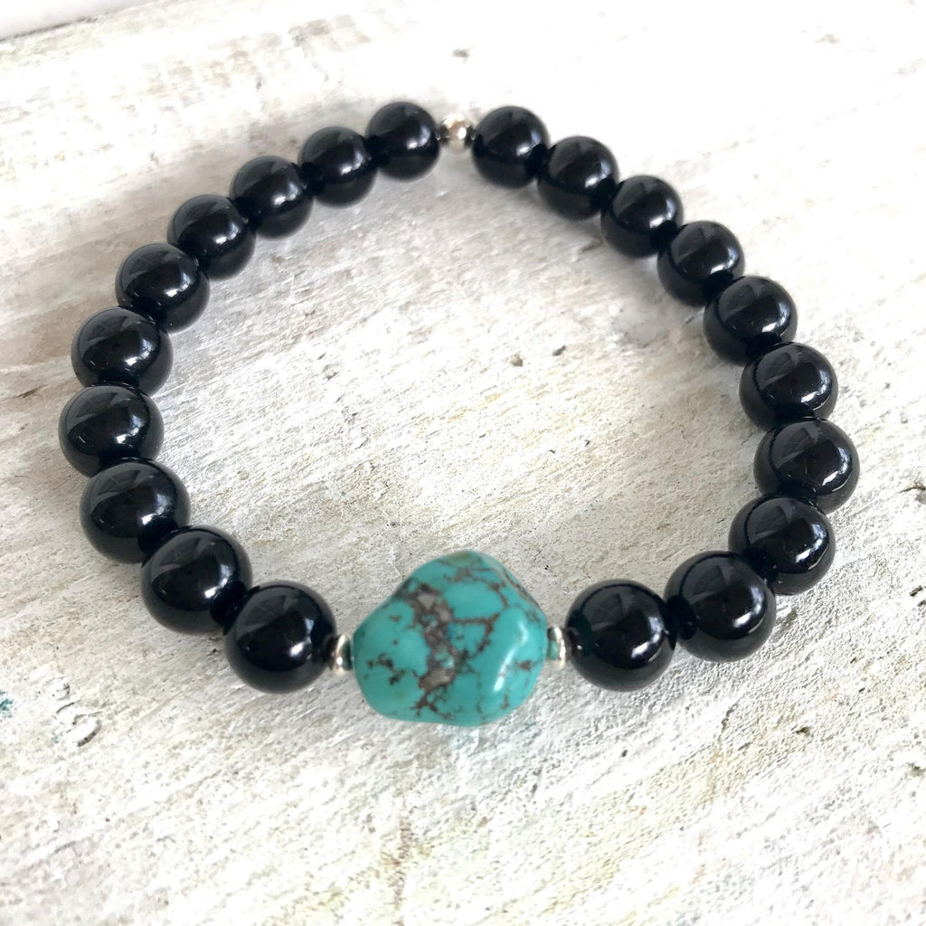 Rainbow obsidian & turquoise Rock Of Turquoise Bracelet by  ZEN by Karen Moore on white wood