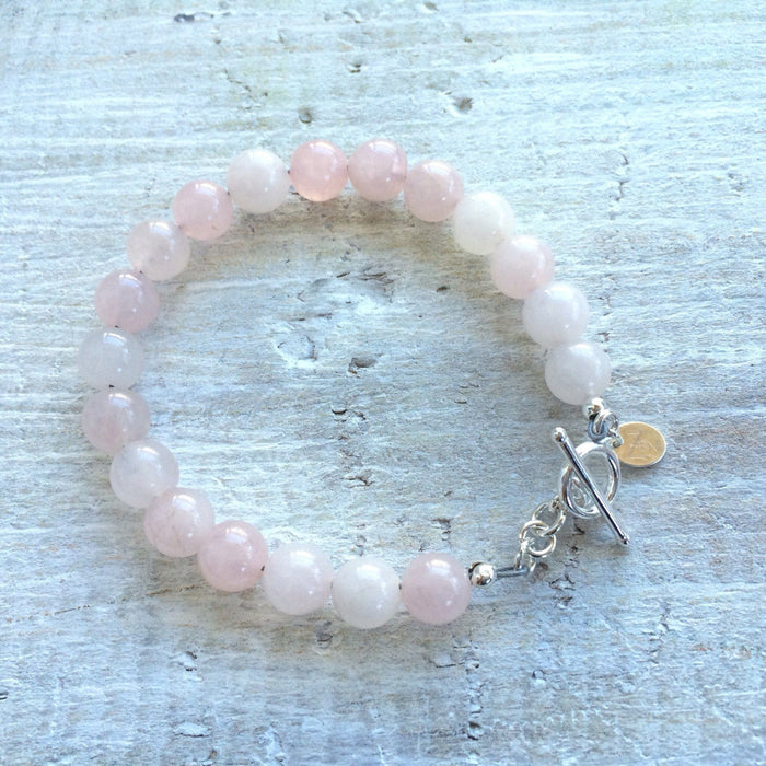 I Am Love rose quartz bracelet by ZEN by Karen Moore on white wood