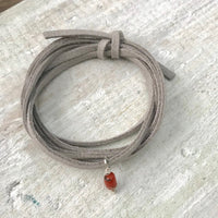 Life Of The Sea Coral Eco Zen Wrap Jewelry by ZEN by Karen Moore on white wood