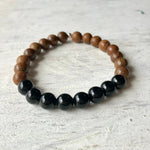 Just Do It tiger wood and obsidian bracelet by ZEN by Karen Moore on white wood