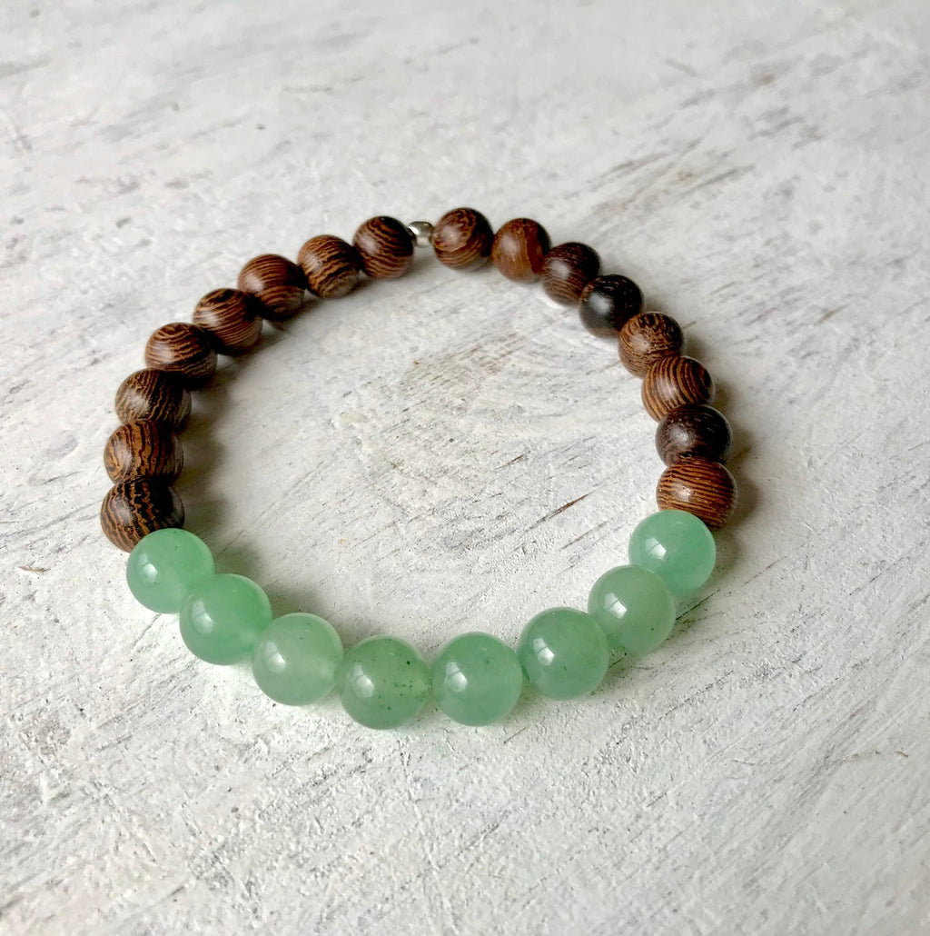 Bring On Wellness tiger wood and aventurine bracelet by ZEN by Karen Moore on white wood