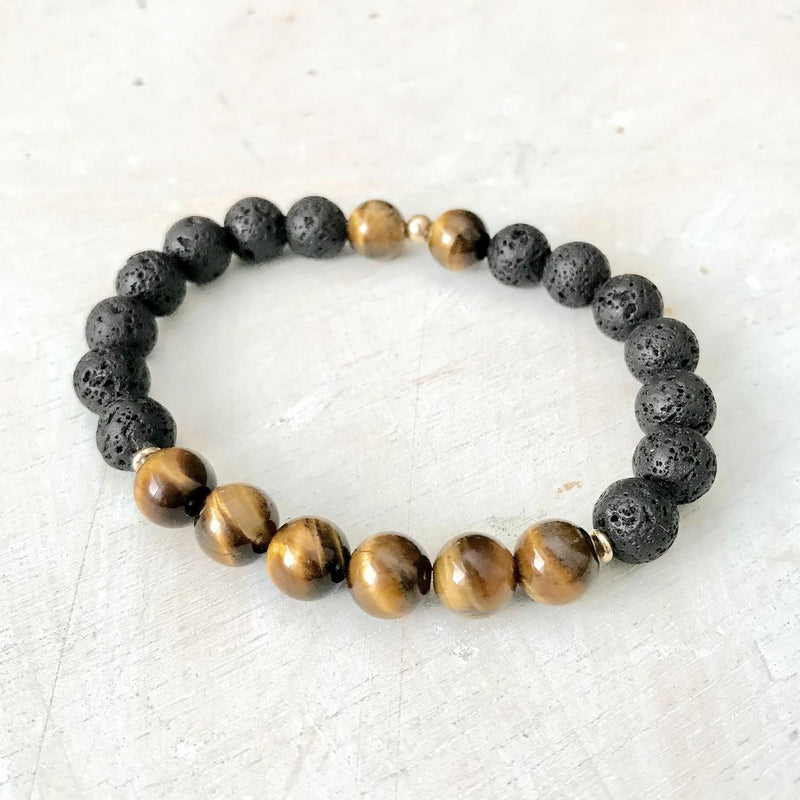 Tiger eye & lava stone Be Fortunate Aromatherapy Bracelet by ZEN by Karen Moore on white wood