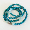 Apatite & amazonite Buddha Bliss ZEN Mini Mala prayer beads by Zen by Karen Moore wrapped as a bracelet on white background