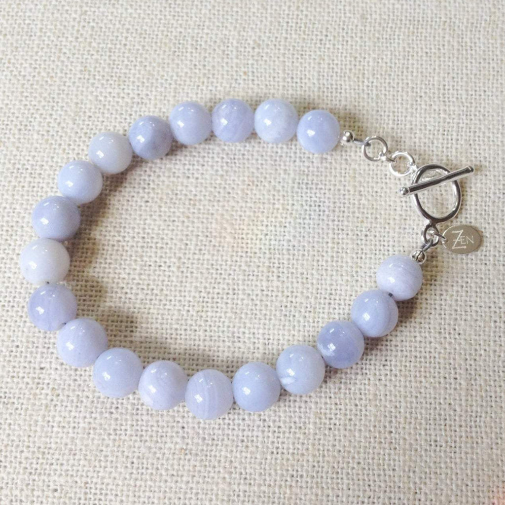 Blue lace agate Be Happy Bracelet by Zen by Karen Moore on cream cloth