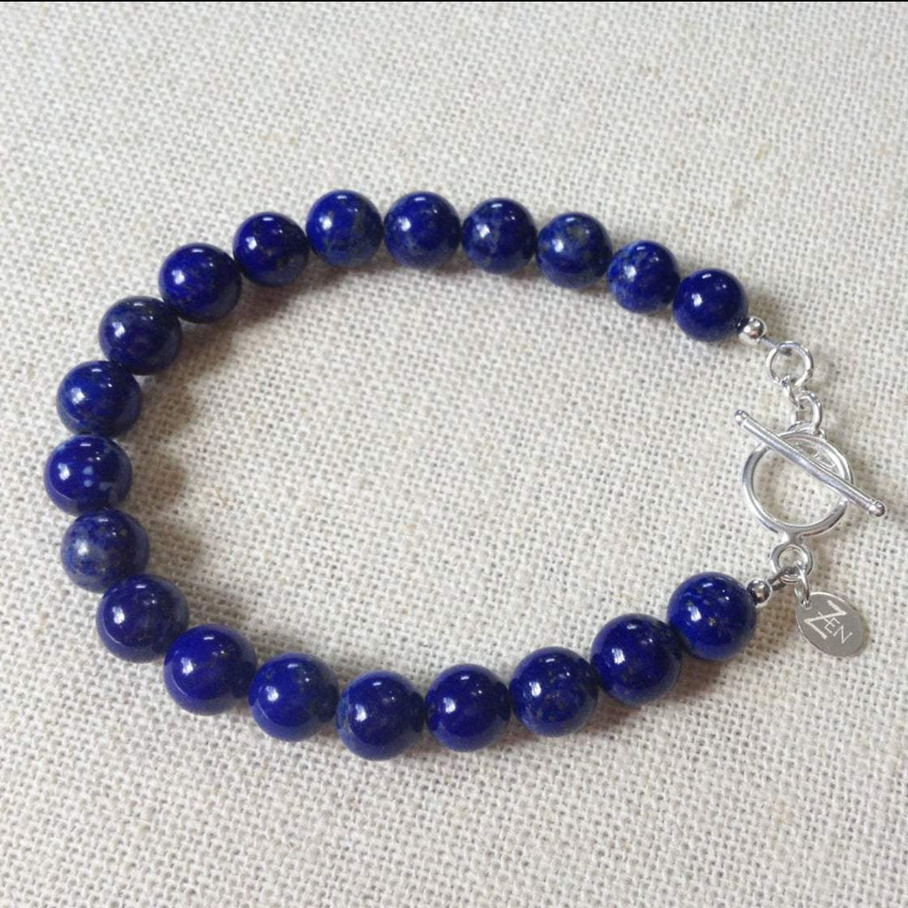 I Am Peace lapis lazuli bracelet by ZEN by Karen Moore on cream cloth