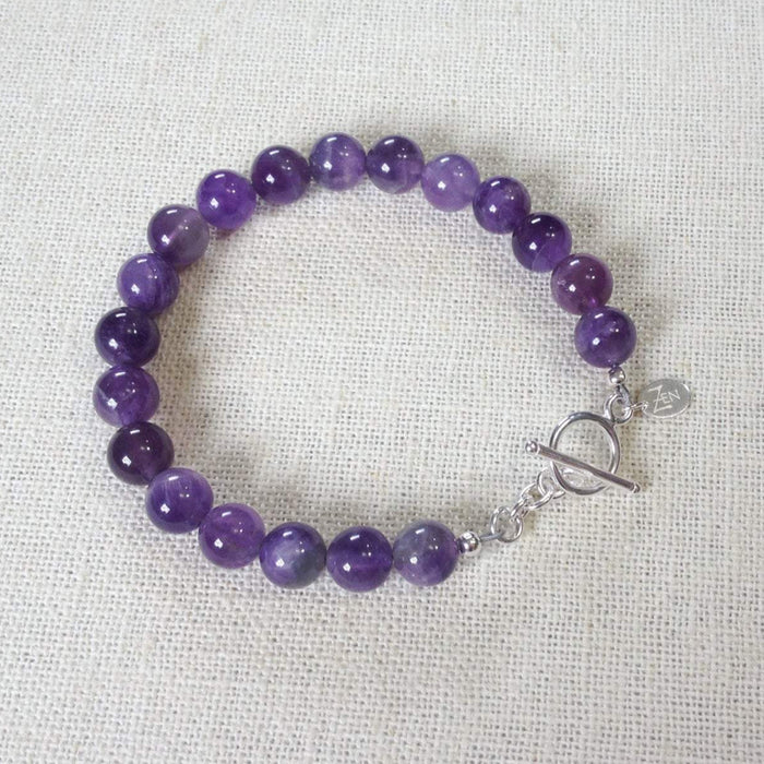 I Trust Myself amethyst bracelet by Zen by Karen Moore on white cloth