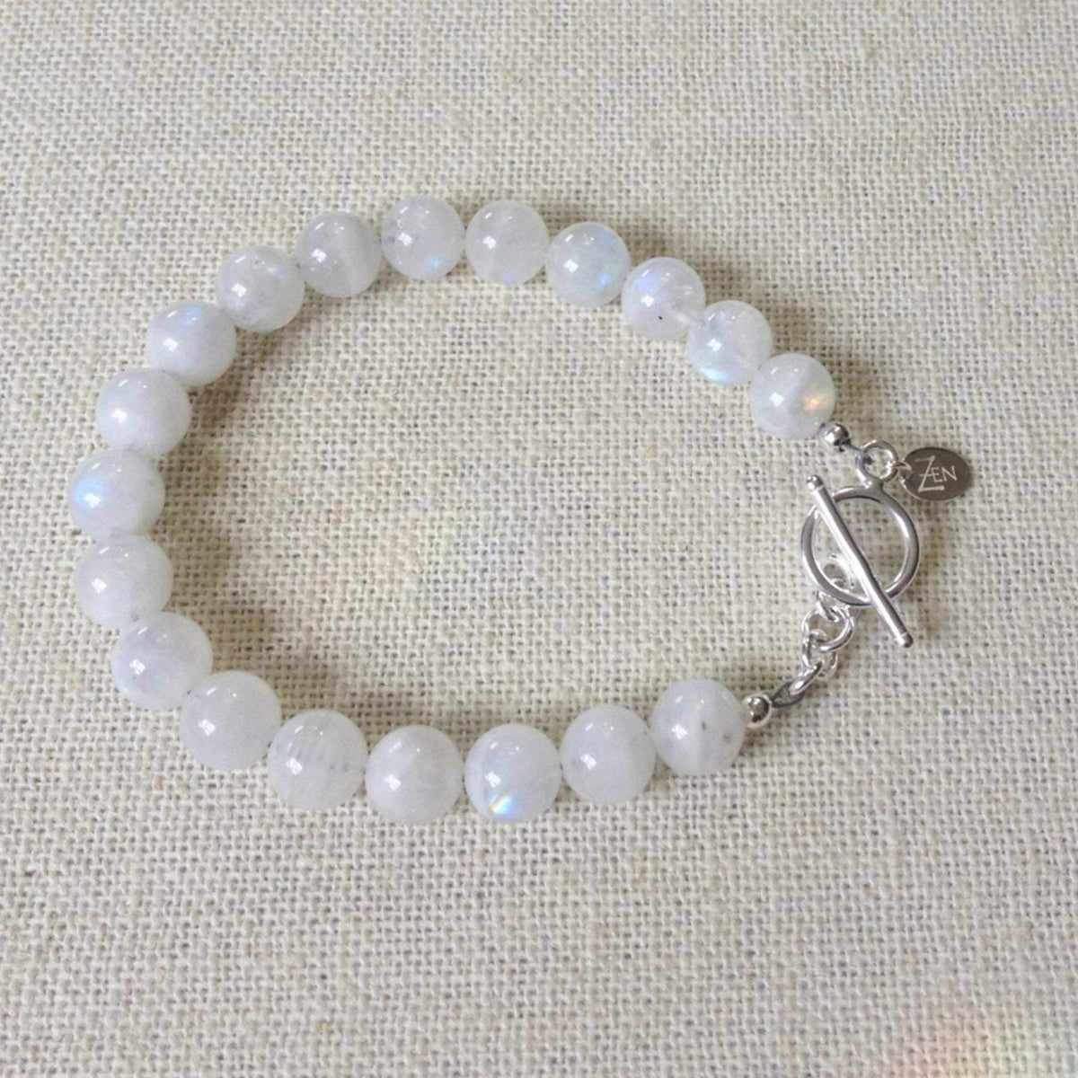 The Goddess moonstone bracelet by ZEN by Karen Moore on cream cloth
