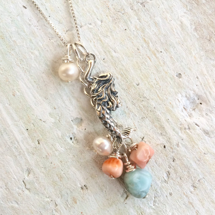 Mermaid Treasure Charm Necklace by ZEN by Karen Moore on white wood