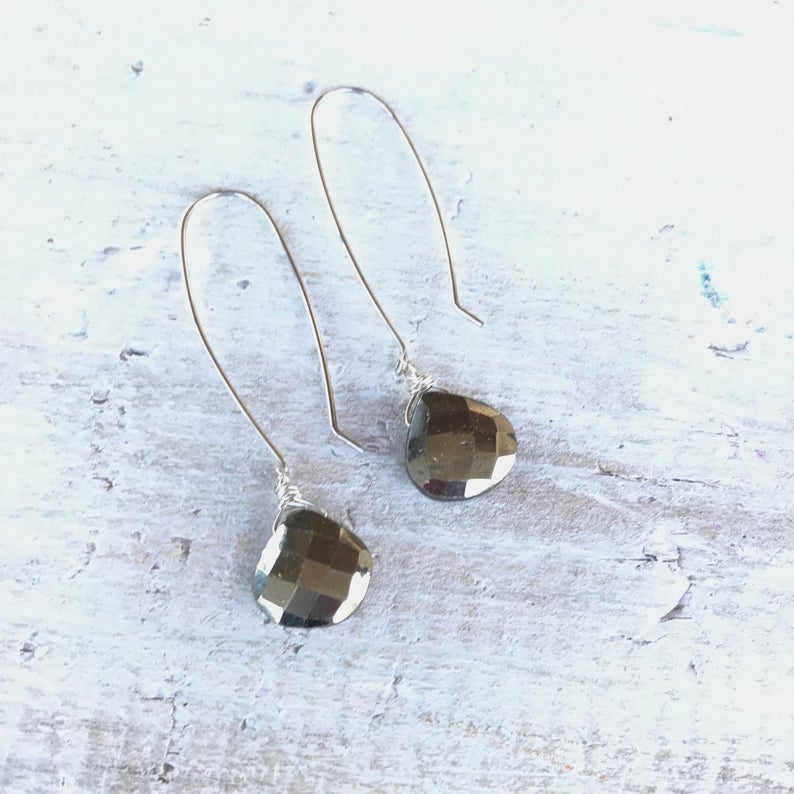 Magnificent Manifestor pyrite earrings in sterling silver by ZEN by Karen Moore alternate view on white wood