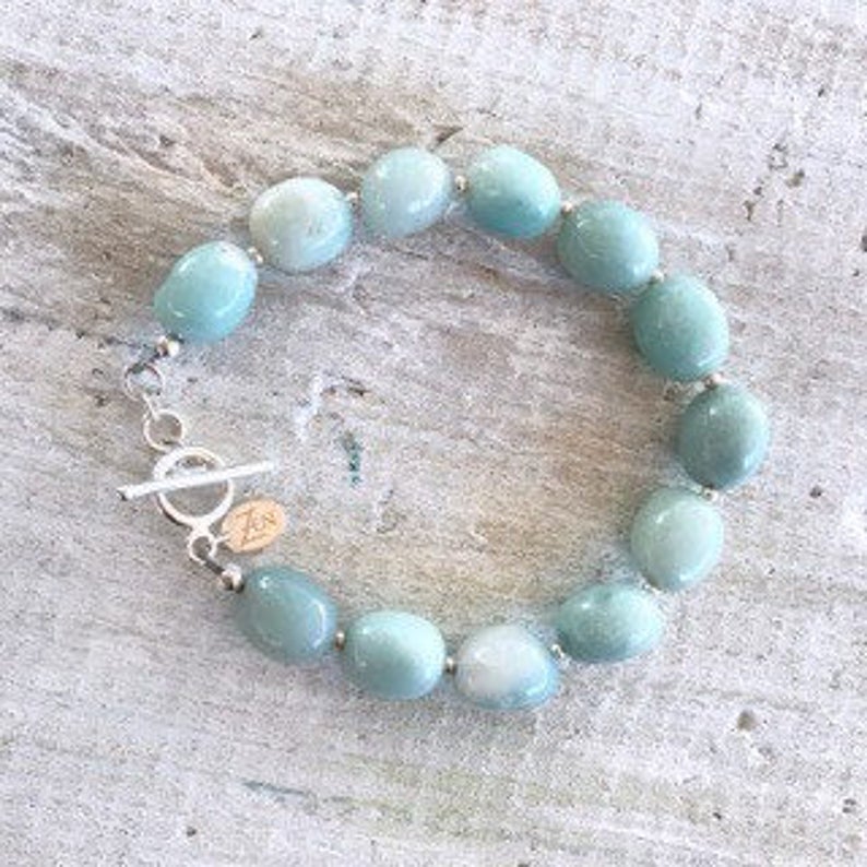 Amazonite Seas The Day Bracelet by ZEN by Karen Moore jewelry close up view on white wood