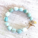 Amazonite Seas The Day Bracelet by ZEN by Karen Moore jewelry with gold clasp on white wood