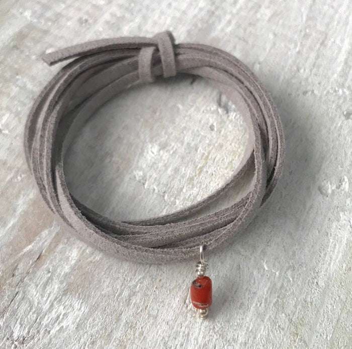 Life Of The Sea Coral Eco Zen Wrap Jewelry by ZEN by Karen Moore close up on white wood