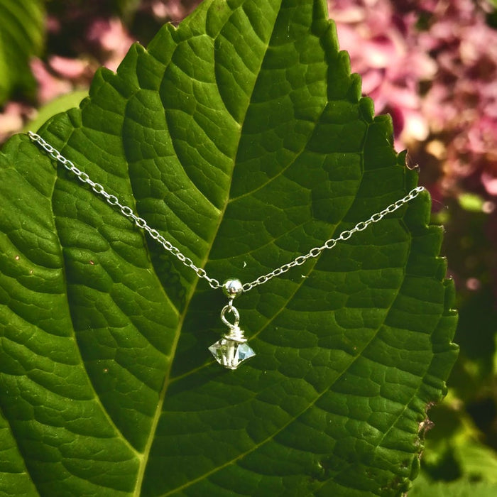 Shine On Herkimer Diamond Bracelet by ZEN by Karen Moore jewelry shown on leaf