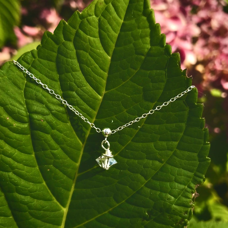 Shine On Herkimer Diamond Bracelet by ZEN by Karen Moore jewelry shown on leaf