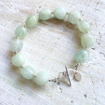 Courage To Be You Aquamarine Bracelet by ZEN by Karen Moore with silver accents close-up view on white background