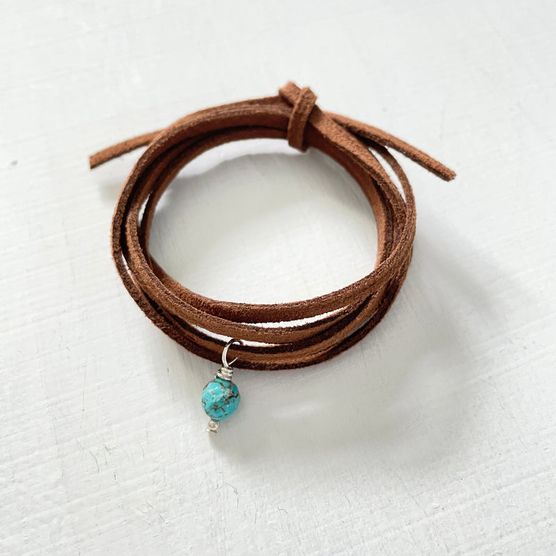 Strength & Balance Turquoise Eco Zen Wrap Jewelry by ZEN by Karen Moore with brown strap on white background