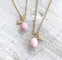 Star of the Ocean Conch Shell Charm Necklace by ZEN by Karen Moore on white wood