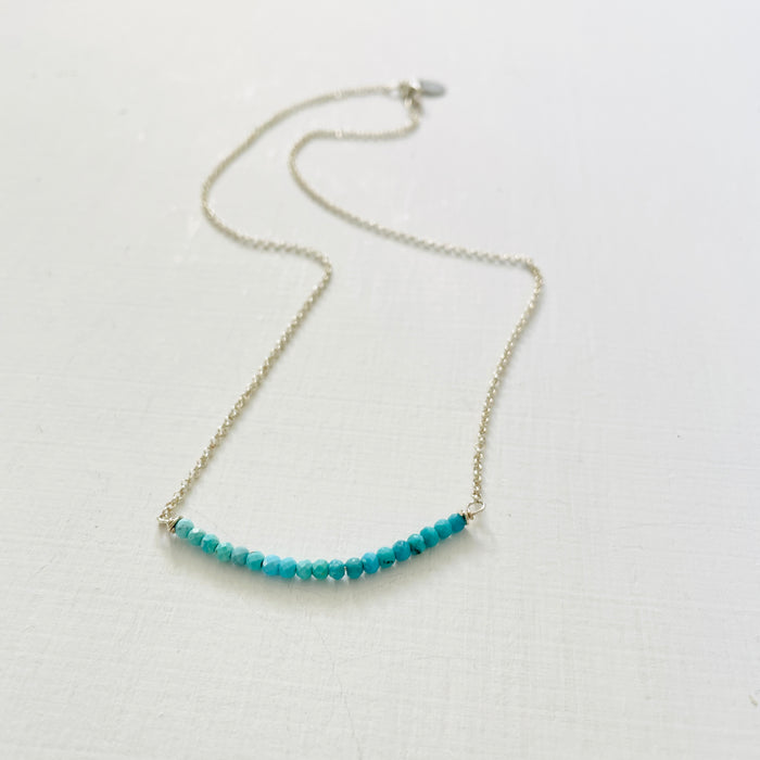 Turquoise Smile Necklace by ZEN by Karen Moore zoomed out view on white background