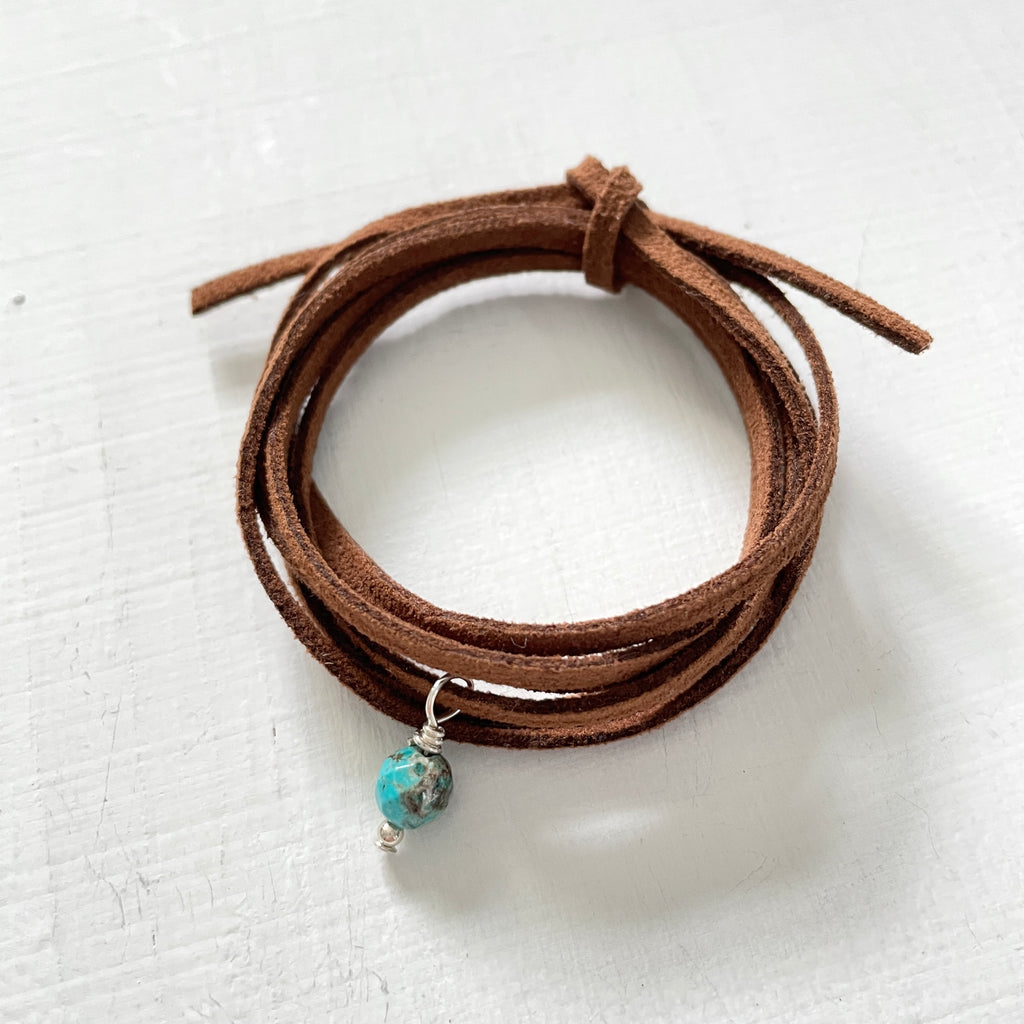 Strength & Balance Turquoise Eco Zen Wrap Jewelry by ZEN by Karen Moore with brown strap close up on white background