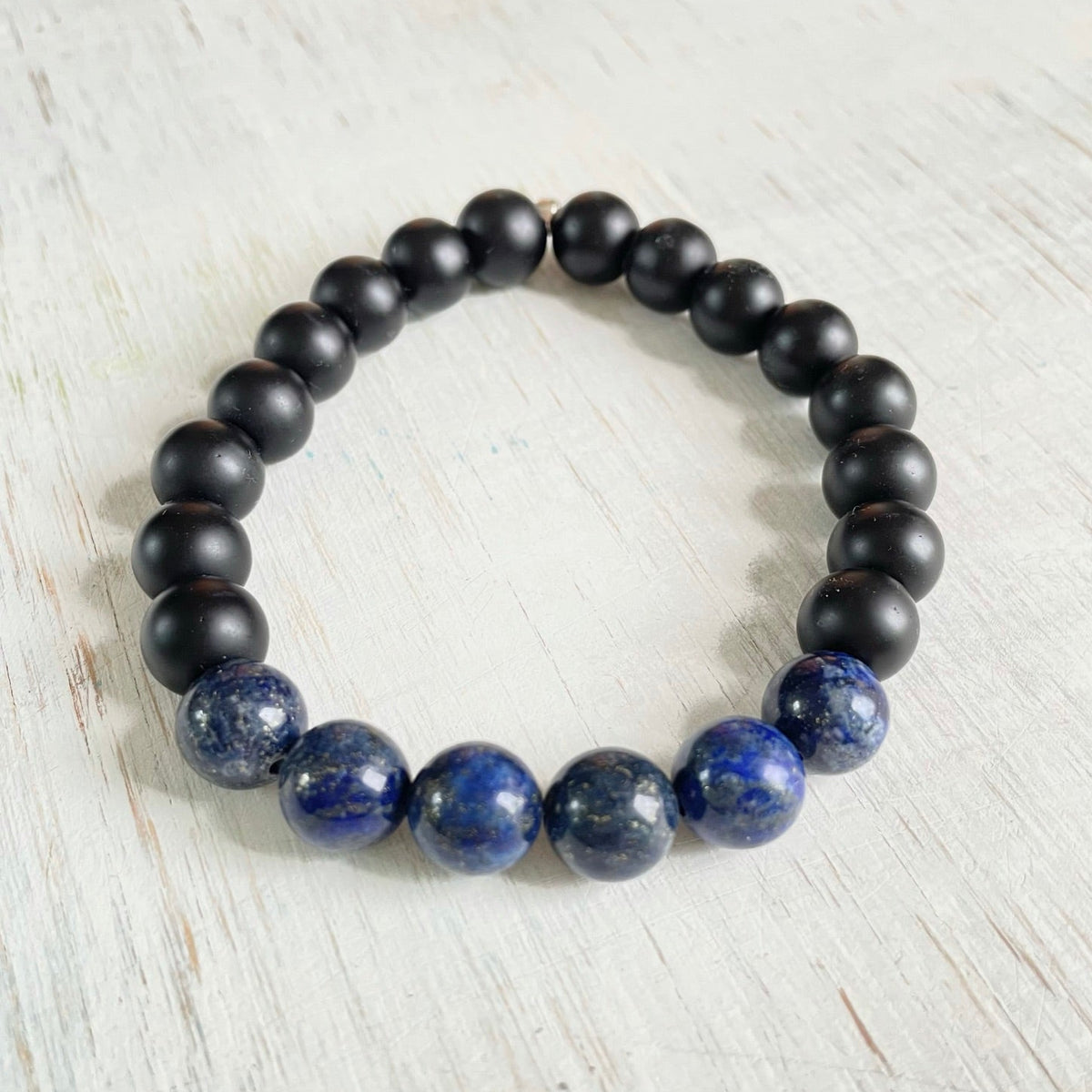 Truth of your Soul Lapis Lazuli & Onyx Menz ZEN Bracelet on white wood background